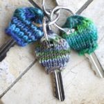 Trio of Key Cozies made with the key cozy pattern