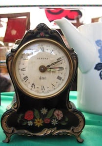 Antique german clock with a round face