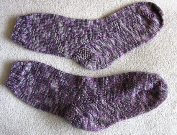Comparison of previously blocked and unblocked sock after wash and dry