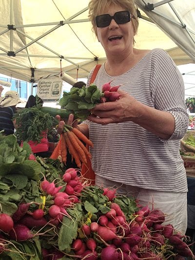My mom at the California Avenue Farmer's Market in Palo Alto