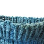 Italian cast-on edge on worsted turquoise yarn