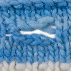 Two-row buttonhole on blue stockinette stitch