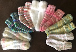 Many Baby Socks from Knitting Superstar